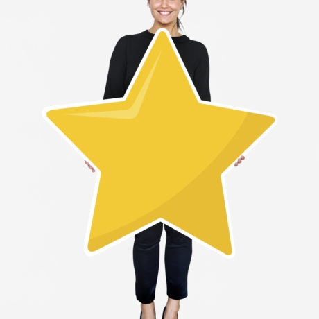 Businesswoman holding a golden star rating symbol