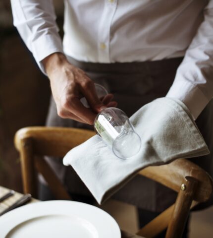 Restaurant Staff Setting Table in Restaurant for Reception